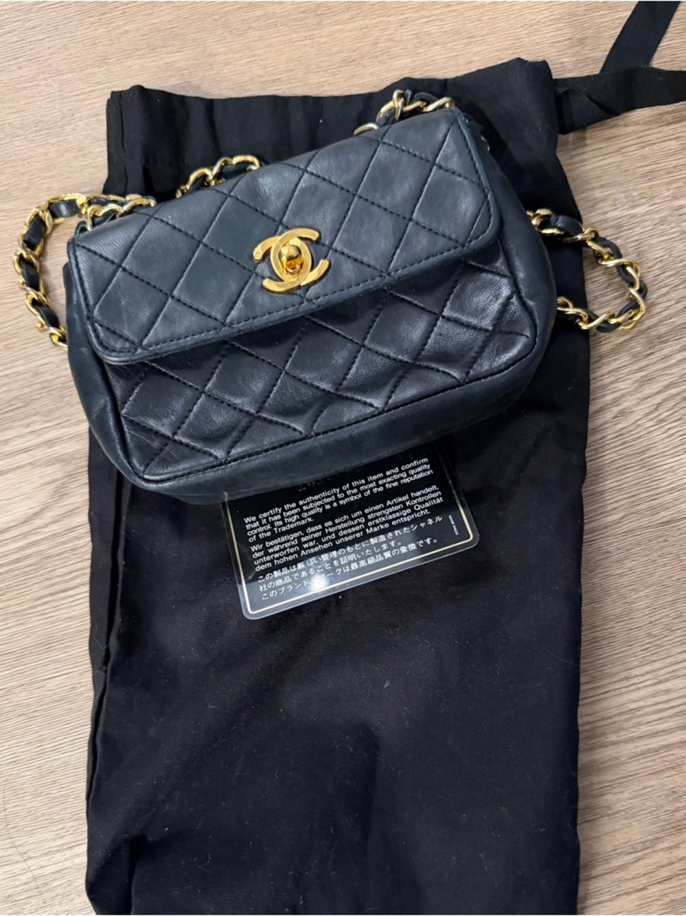 CHANEL Black Quilted Leather Crossbody with Gold Chain and CC Lock